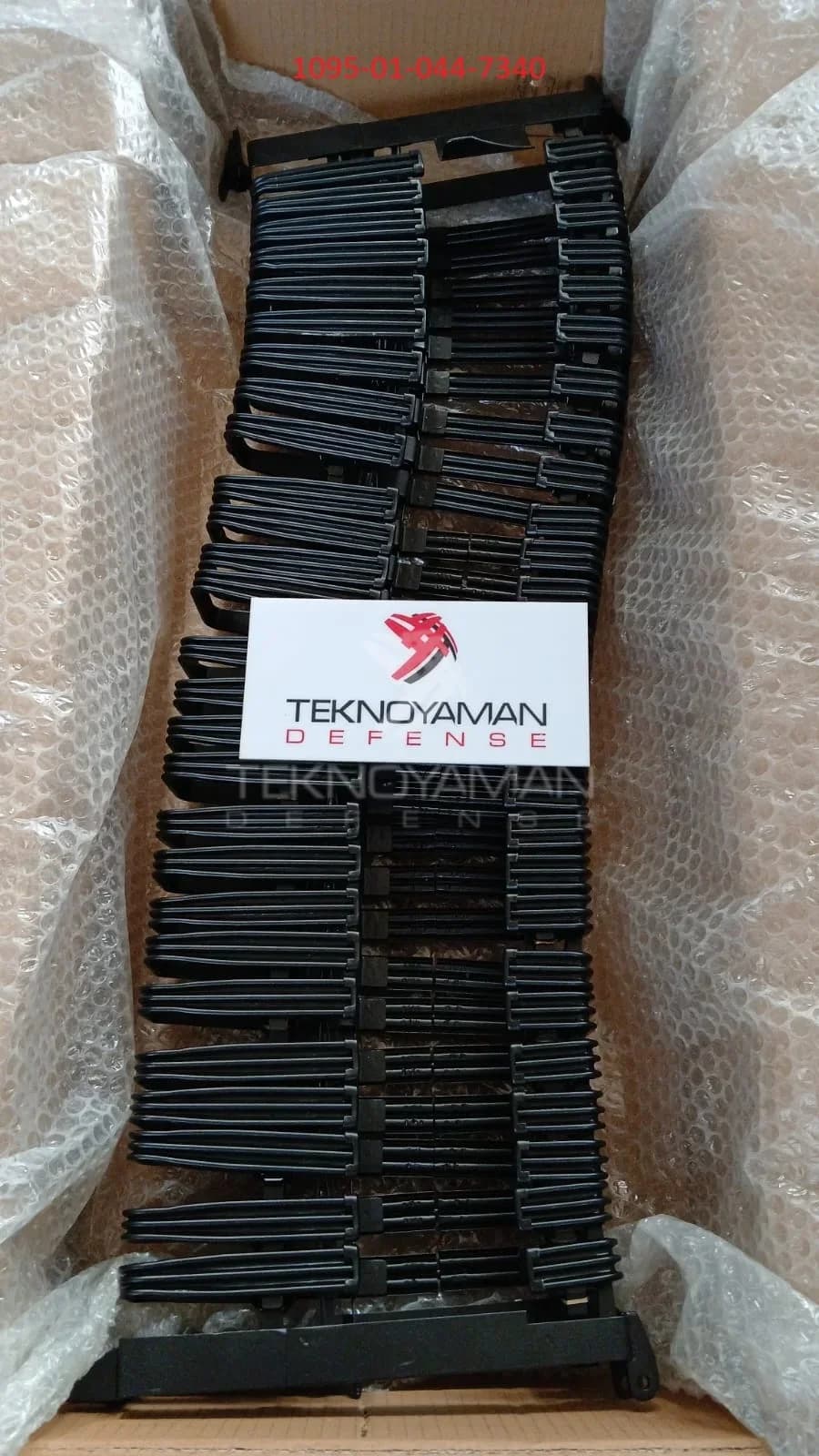 AMMO CHUTE ASSY — NSN 1095-01-044-7340